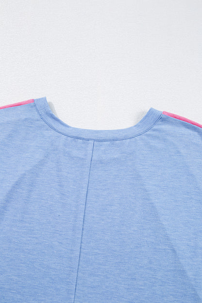 T-shirt grande taille bleu ciel à imprimé léopard et patch colorblock