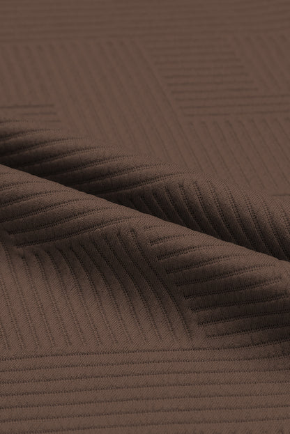 Conjunto de camiseta holgada con textura gris y pantalón con cordón