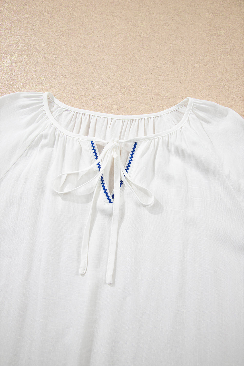 White Floral Embroidered Drawstring V Neck Blouse