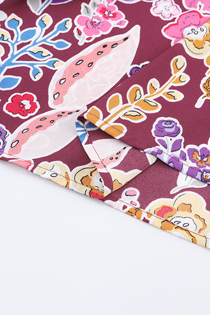 Chemisier à manches bouffantes et motifs floraux multicolores 