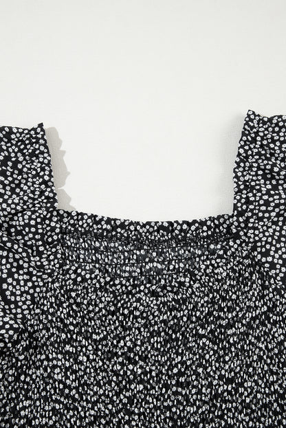 Robe mi-longue noire à imprimé floral et manches longues à col carré