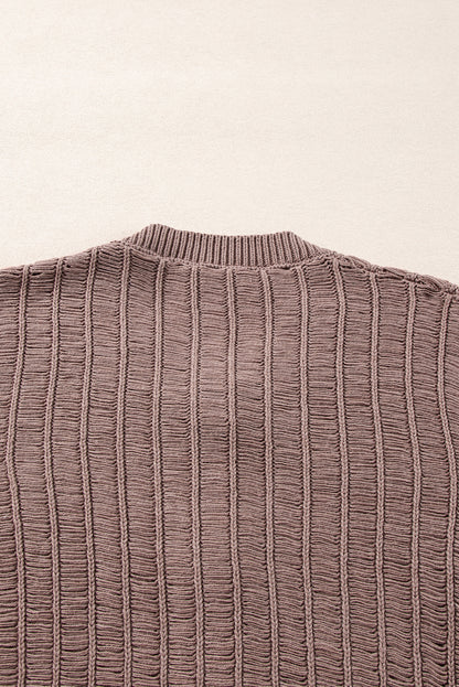 Cardigan boutonné en tricot texturé découpé en chèvre