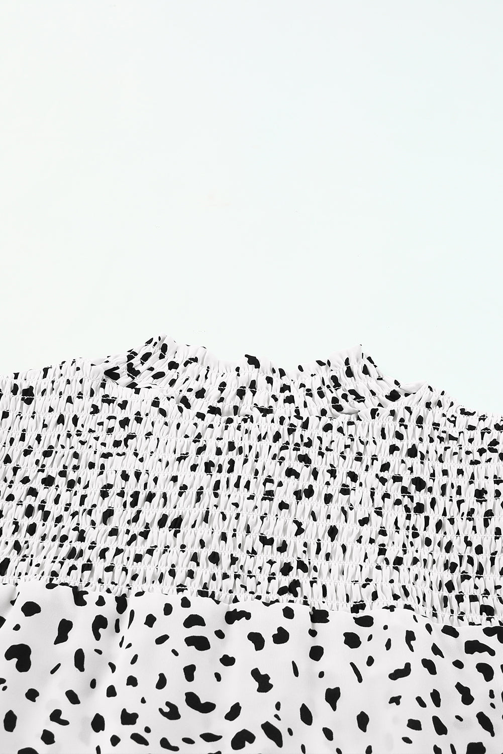 Blusa con mangas abullonadas y detalle fruncido