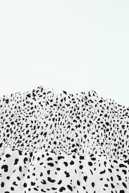 Blusa con mangas abullonadas y detalle fruncido