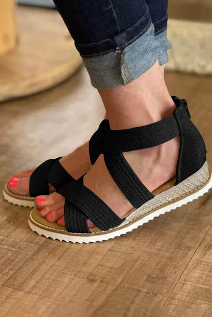 Sandalias de cuña baja con cremallera y tiras cruzadas en beige