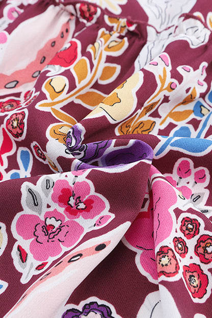 Chemisier à manches bouffantes et motifs floraux multicolores 