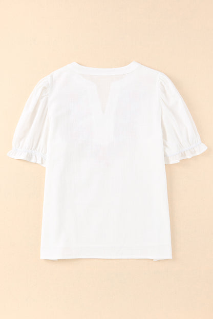 Blusa de manga farol con volantes y bordado floral 