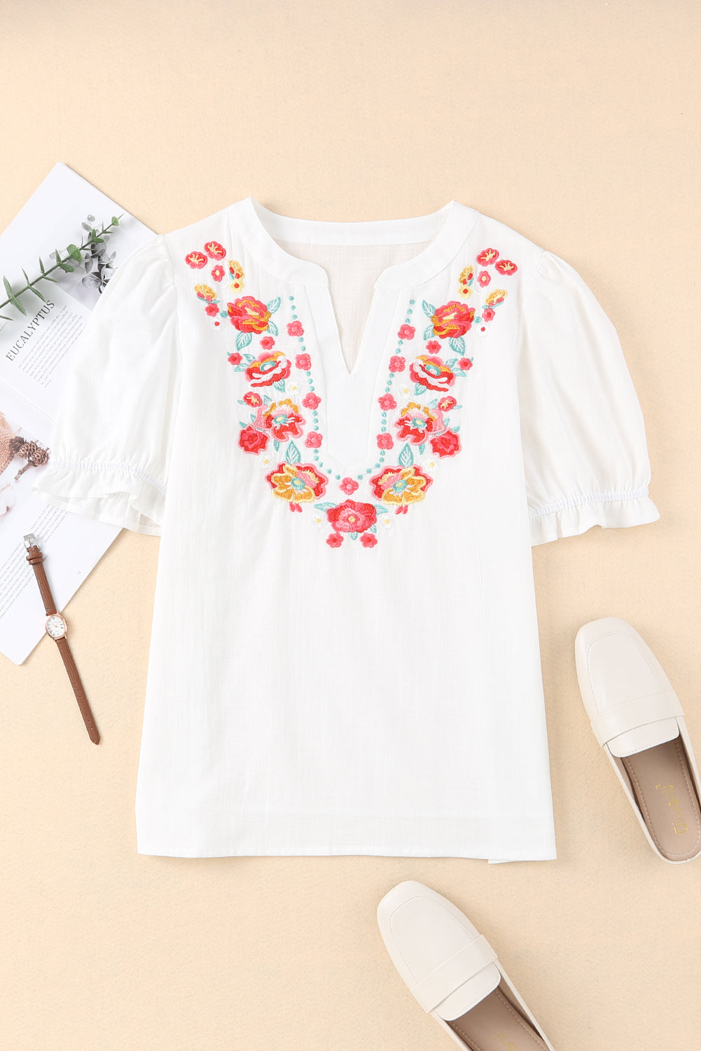 Blusa de manga farol con volantes y bordado floral 