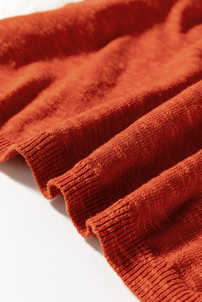 Pull orange uni à manches courtes et col en V fendu