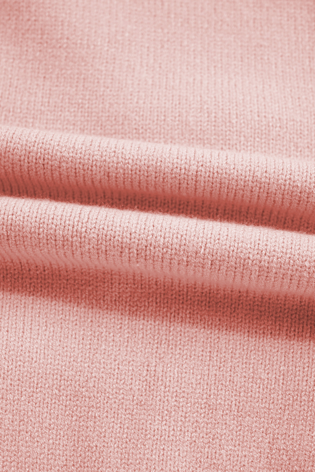 Pull à manches longues rose clair à volants et bordure côtelée avec nœud papillon