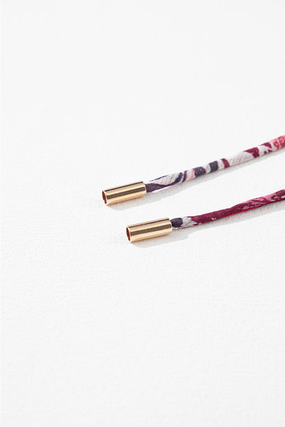 Chemisier blanc à volants et manches courtes, col en V et fleurs