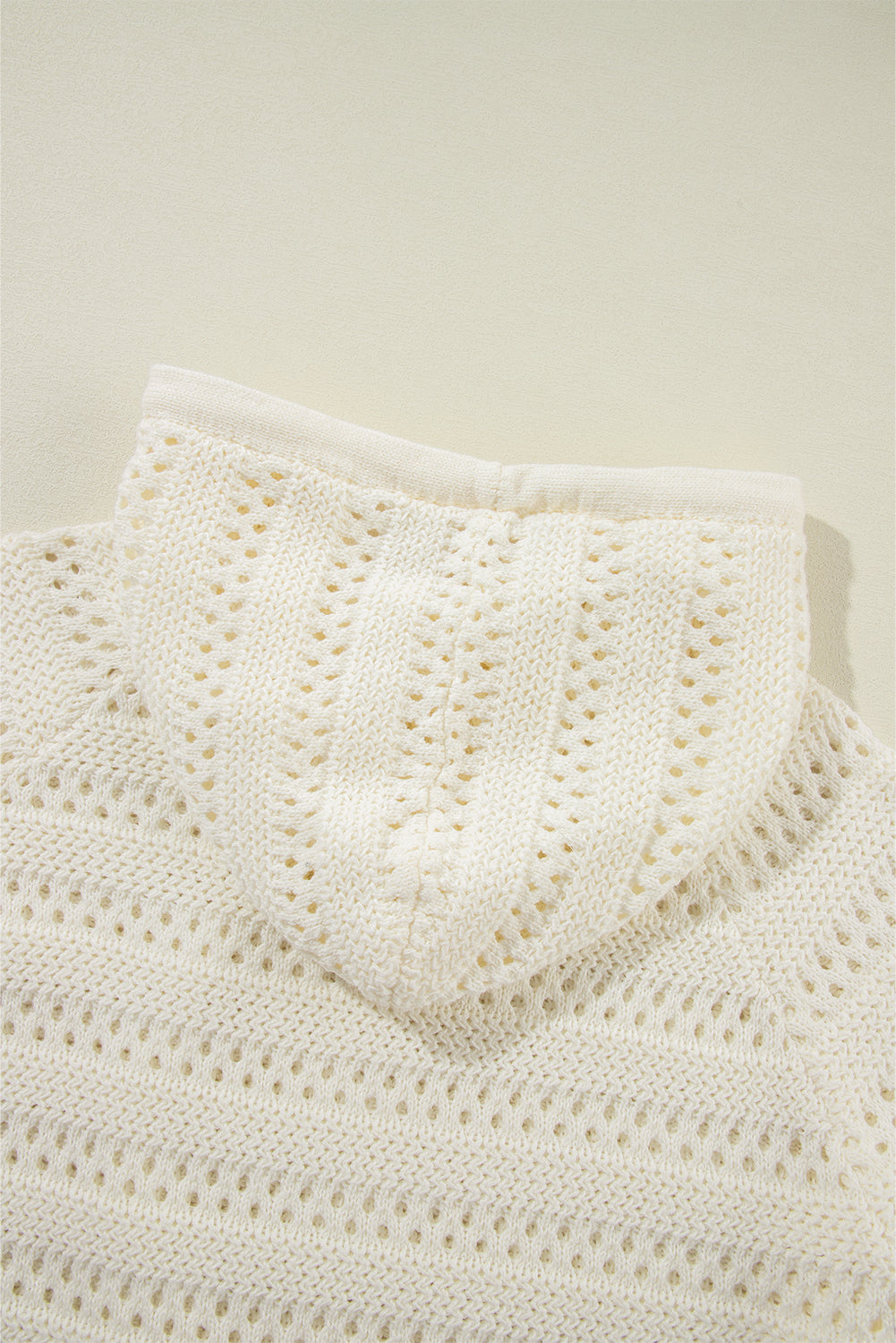 Pull à capuche à manches raglan en tricot pointelle blanc