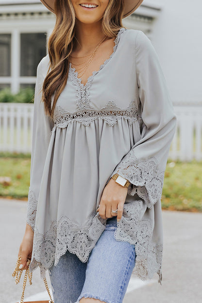 Chemisier à manches cloche et empiècements en crochet