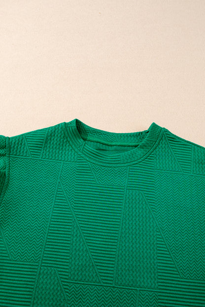 Haut fendu à volants texturé vert foncé et short à cordon de serrage