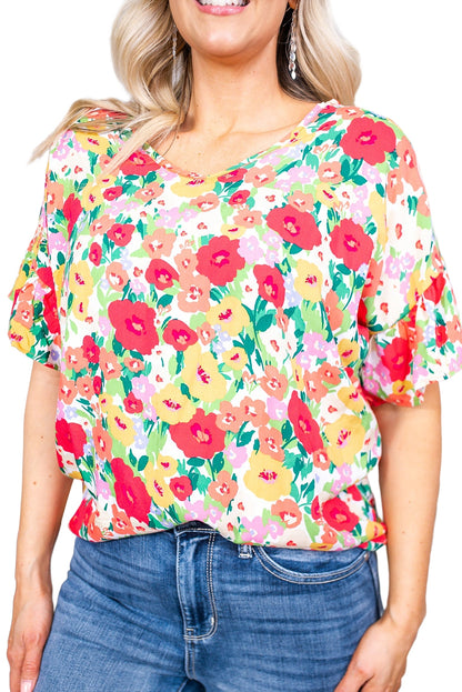 Blusa con cuello en V y manga corta con volantes y estampado floral 
