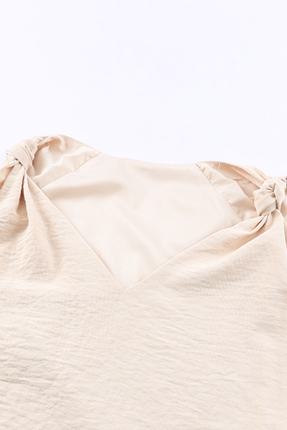 Gilet à col en V et épaules nouées 