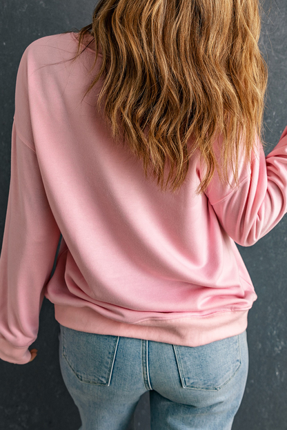 Sweat-shirt rose fantaisie à carreaux avec imprimé Père Noël