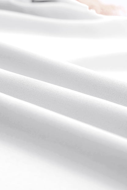 Chemisier à manches courtes et col en V avec bordure en dentelle