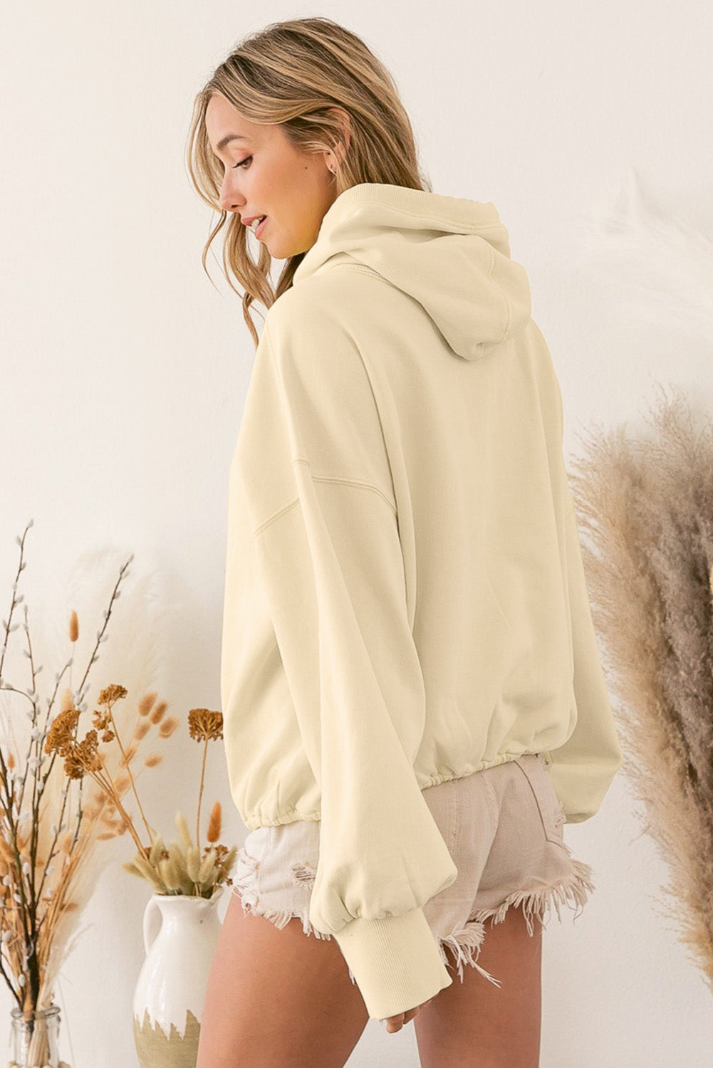 Sweat à capuche zippé beige à bordure côtelée et poche kangourou 