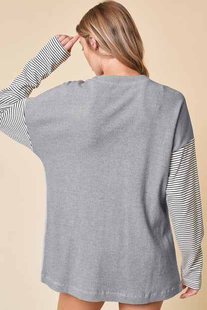 Cardigan ouvert à rayures noires et patchwork avec poche