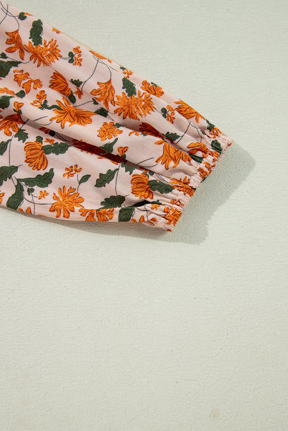 Robe babydoll beige à fleurs, décolleté en V profond, buste froncé, manches bouffantes