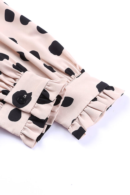 Chemisier oversize à manches bouffantes et poignets à volants boutonnés