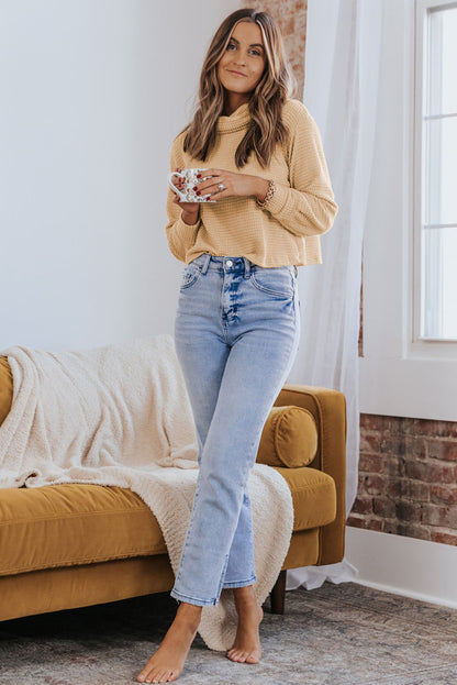 Haut à col roulé et manches longues en tricot gaufré uni abricot 