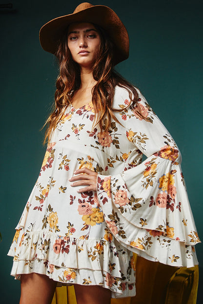 Mini-robe blanche à imprimé floral et manches superposées