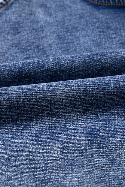 Combinaison en jean bleu crépuscule sans manches à col en U et poches plaquées