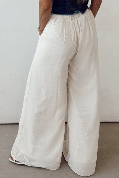 Pantalon large plissé blanc décontracté à taille nouée