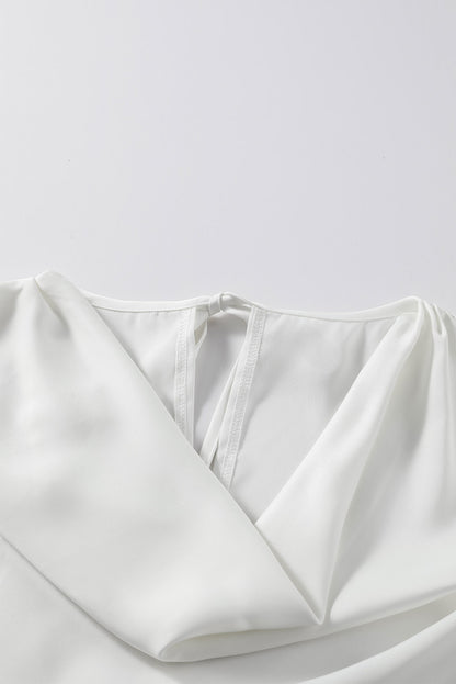 Blusa elegante de manga larga con cuello vuelto negro