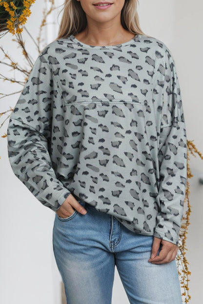 Top holgado de manga larga con costuras y estampado animal marrón