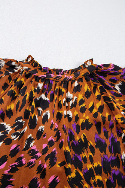 Chemisier orange à imprimé léopard, drapé, manches courtes, col en V fendu