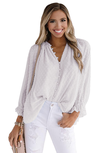 Chemise à pois suisses à boutons amples 