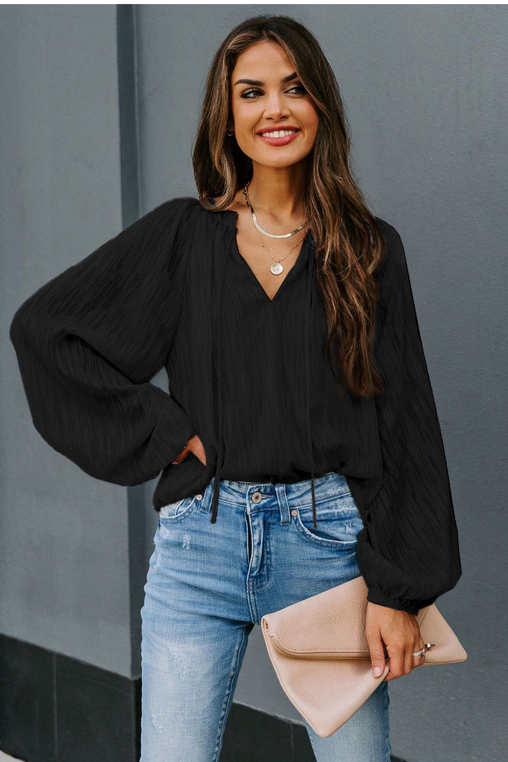 Haut uni texturé à col en V et manches lanternes 