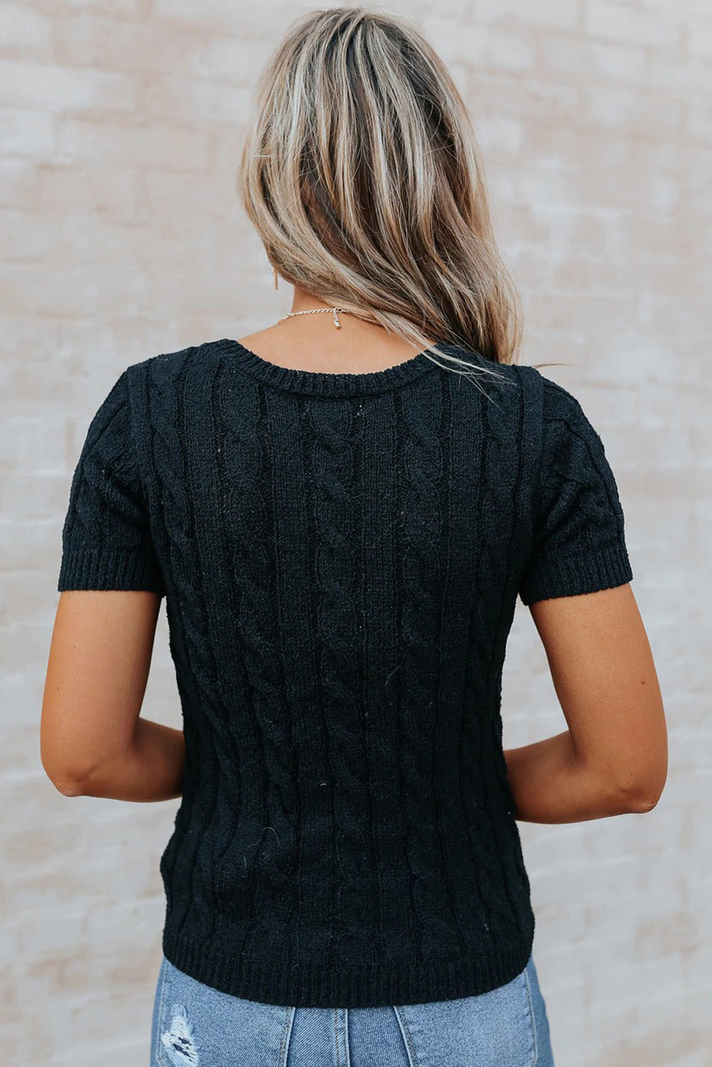 Top caqui de punto de ochos con botones y manga corta