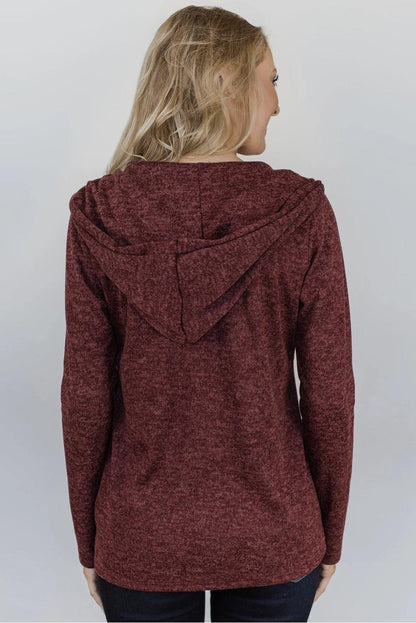 Abrigo tipo cárdigan con cremallera y capucha 