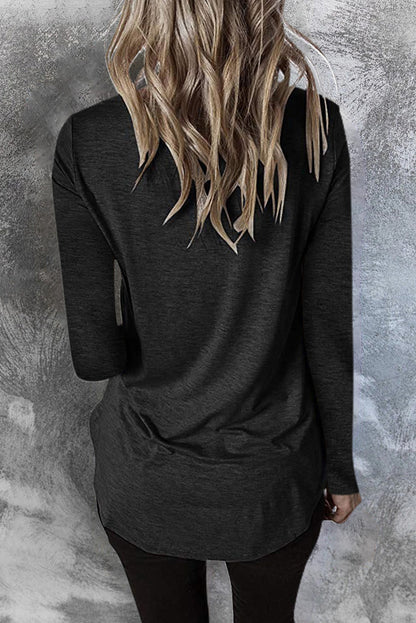 Top de manga larga con cuello en V entrecruzado