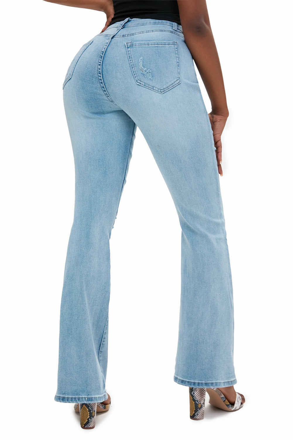 Jeans acampanados desgastados lavados