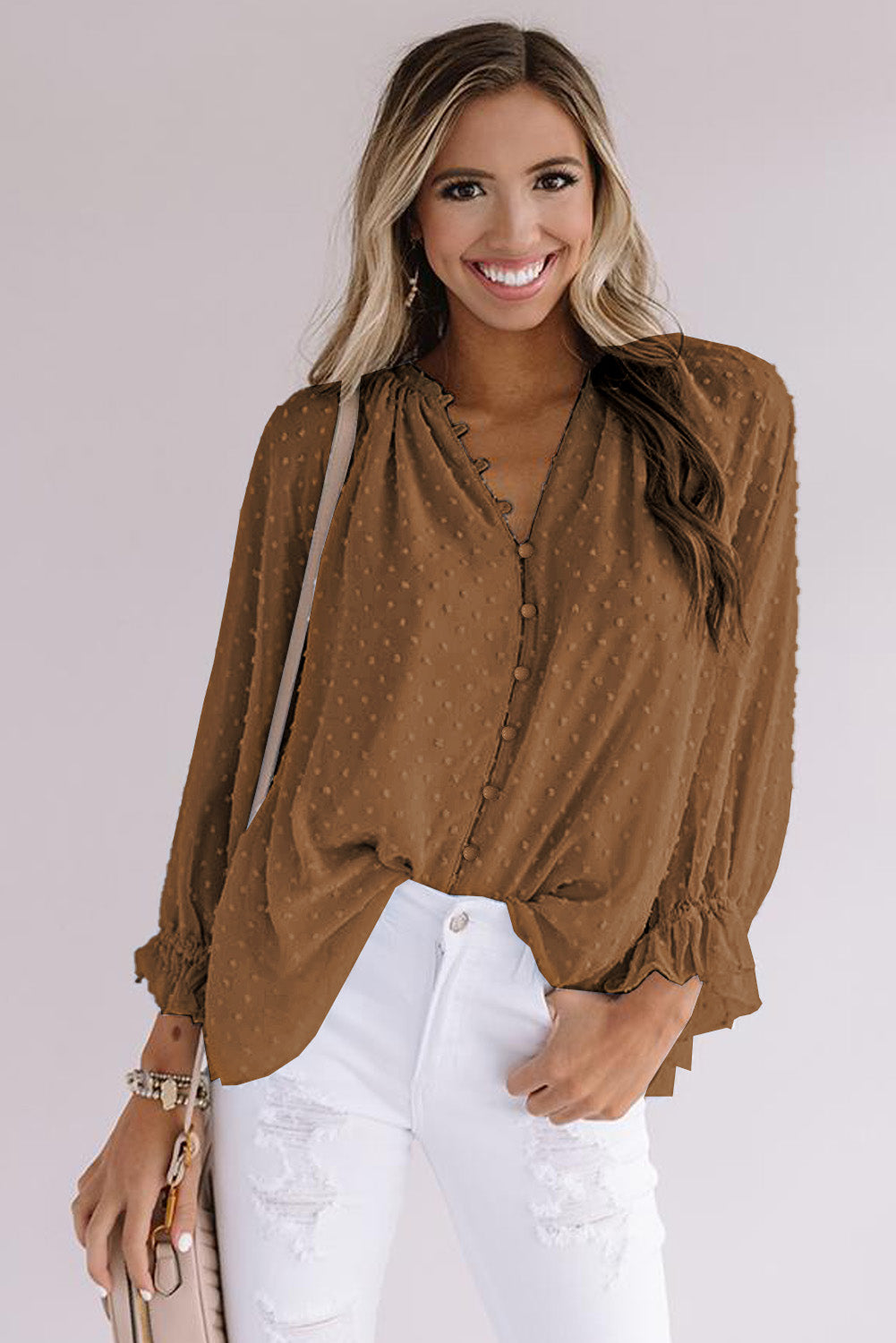 Chemise à pois suisses à boutons amples 