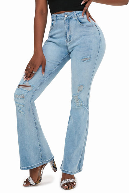 Jeans acampanados desgastados lavados