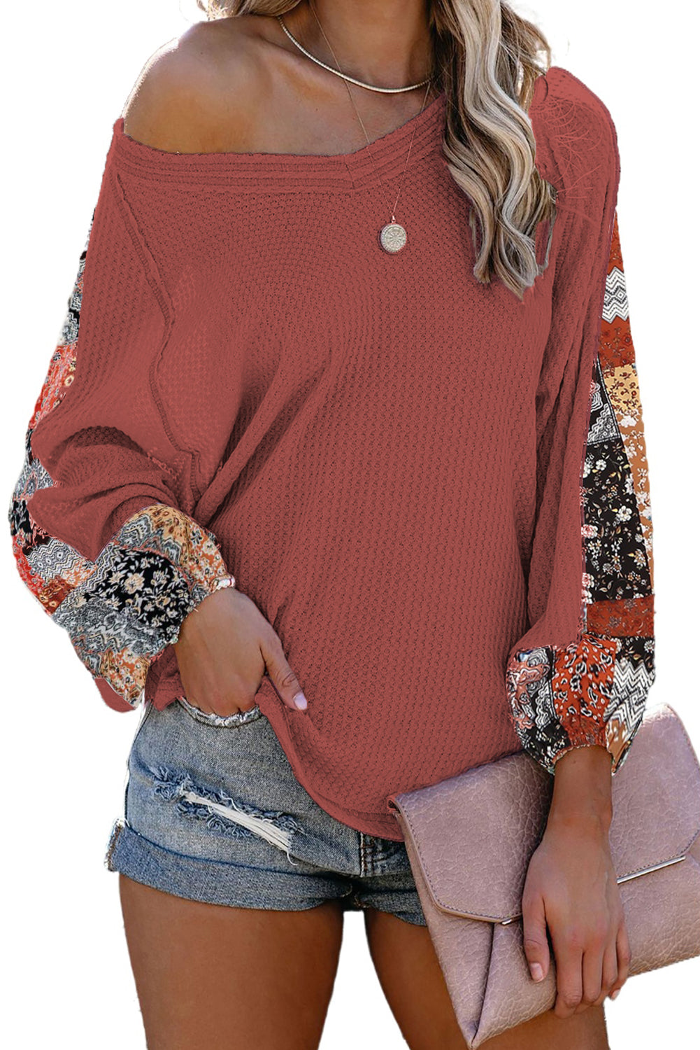 Blusa de punto gofrado con empalme de leopardo