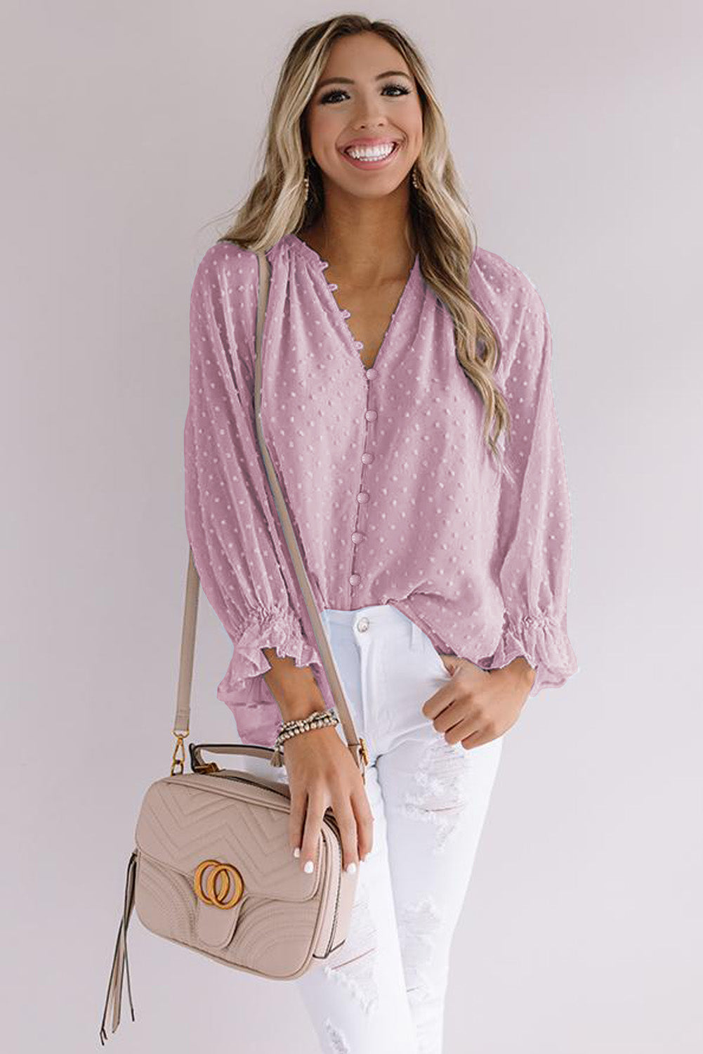 Chemise à pois suisses à boutons amples 