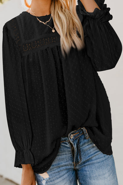 Blusa con mangas con volantes y lunares suizos