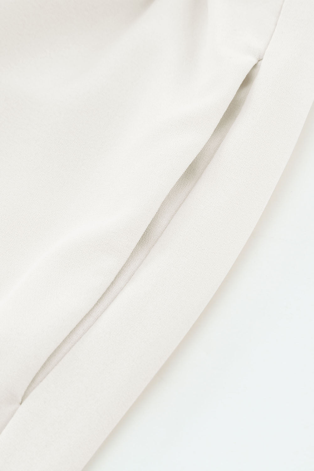 Mono largo de pernera ancha con fruncido y manga alborotada