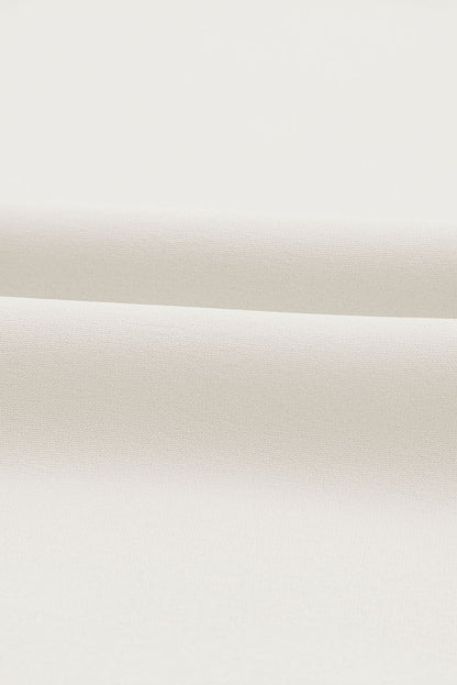 Mono largo de pernera ancha con fruncido y manga alborotada