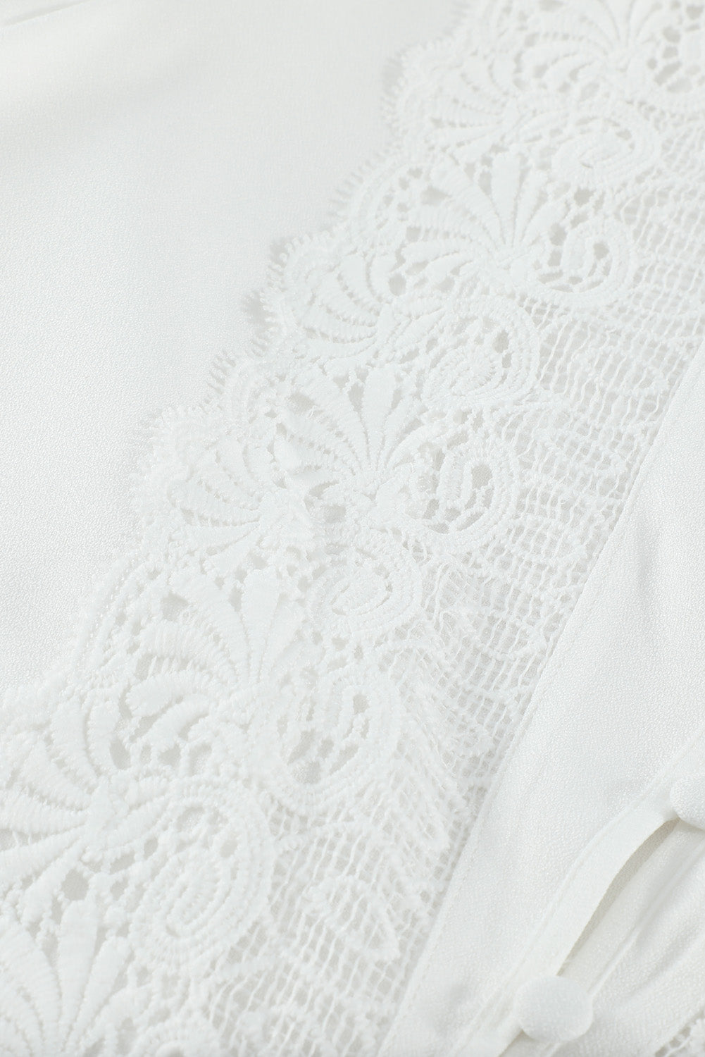 Chemise boutonnée à épissure de dentelle