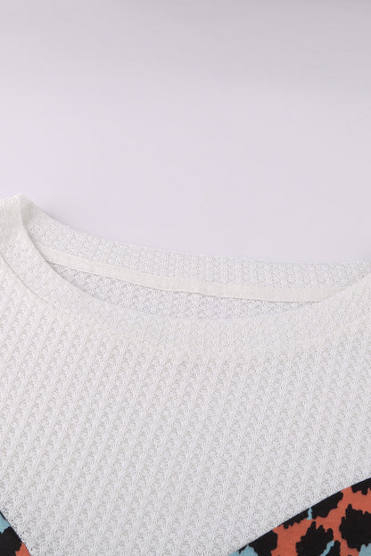 Top de punto con patchwork de leopardo colorblock