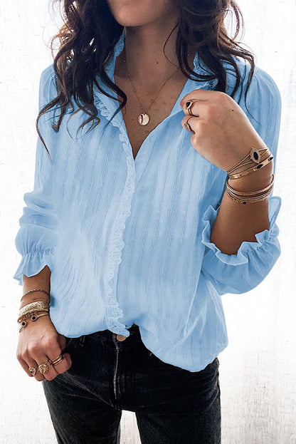 Camisa con volantes y mangas abullonadas