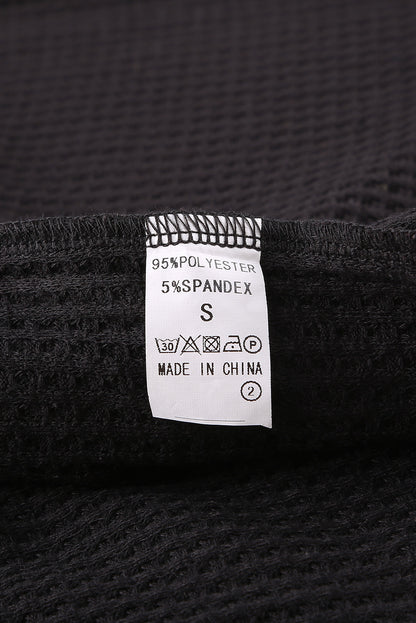 Top de punto con patchwork de leopardo colorblock